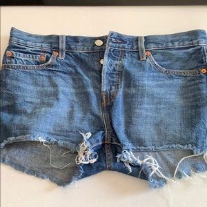 Levi’s cutoff denim shorts, button fly, size 28.